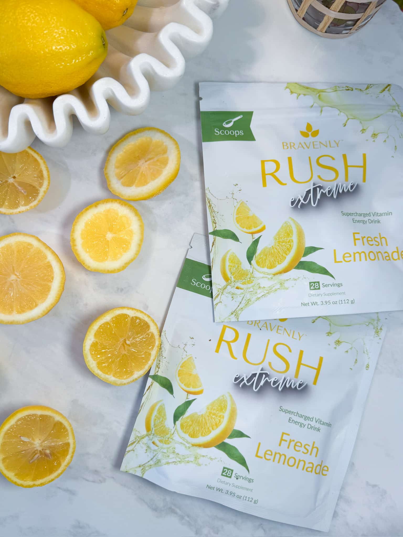 Two Rush Extreme - Fresh Lemonade bags surrounded by lemons